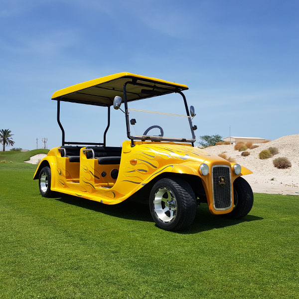Yellow cart on golf course